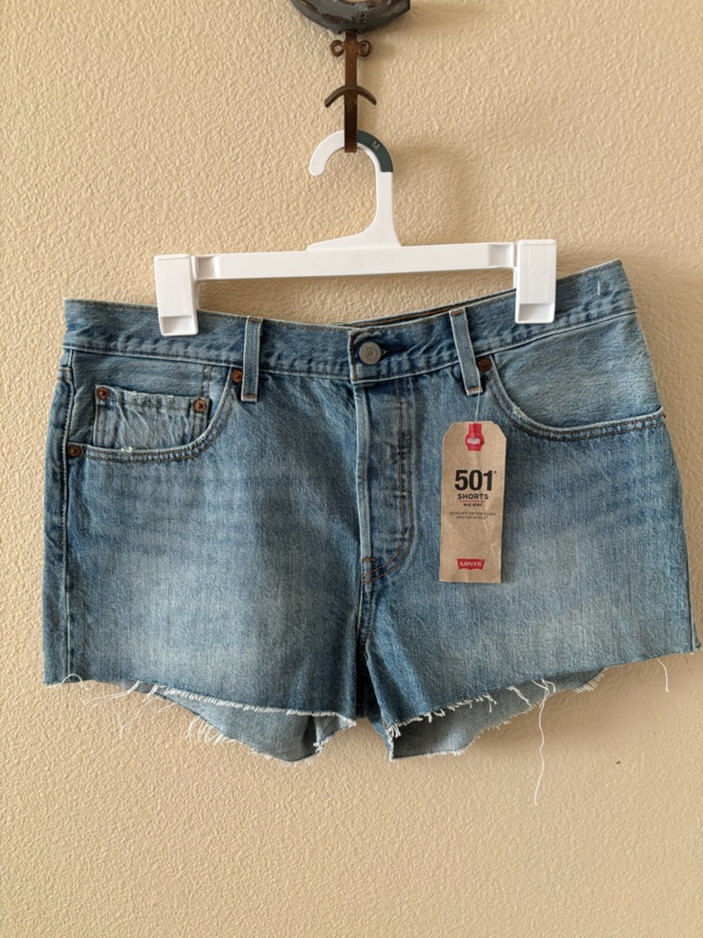 Levi's 501 mid rise Women's Denim Cutoff Shorts in Light Blue Wash